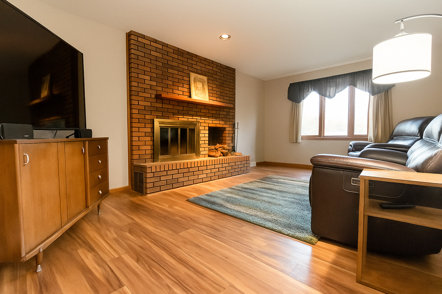 2235 Center Lane Dixon, IL 61021 - Photo 4 of 51 a bedroom with furniture flat screen tv and wooden floor