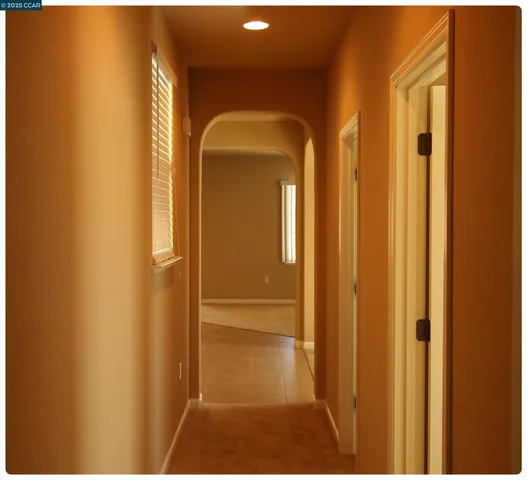 a view of a room with windows