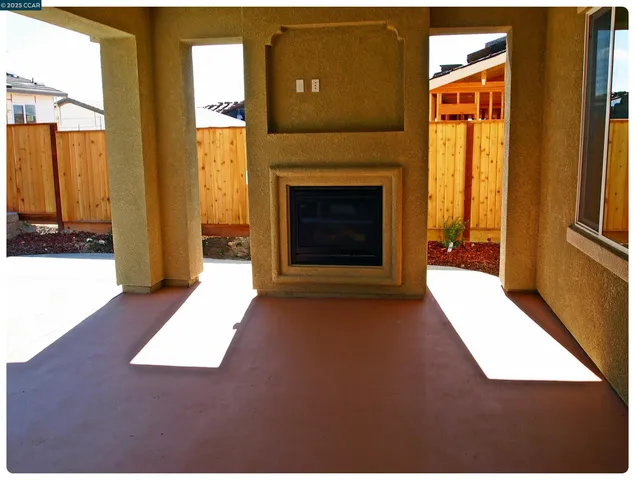 a view of an entryway with a fireplace