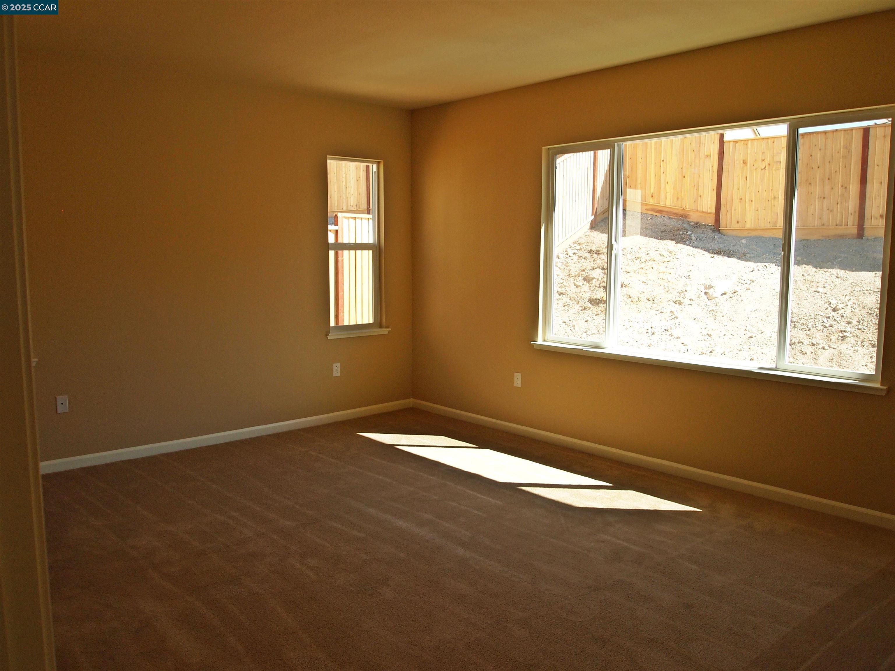 5603 Ventry Way Antioch, CA 94531 - Photo 5 of 19 an empty room with a window