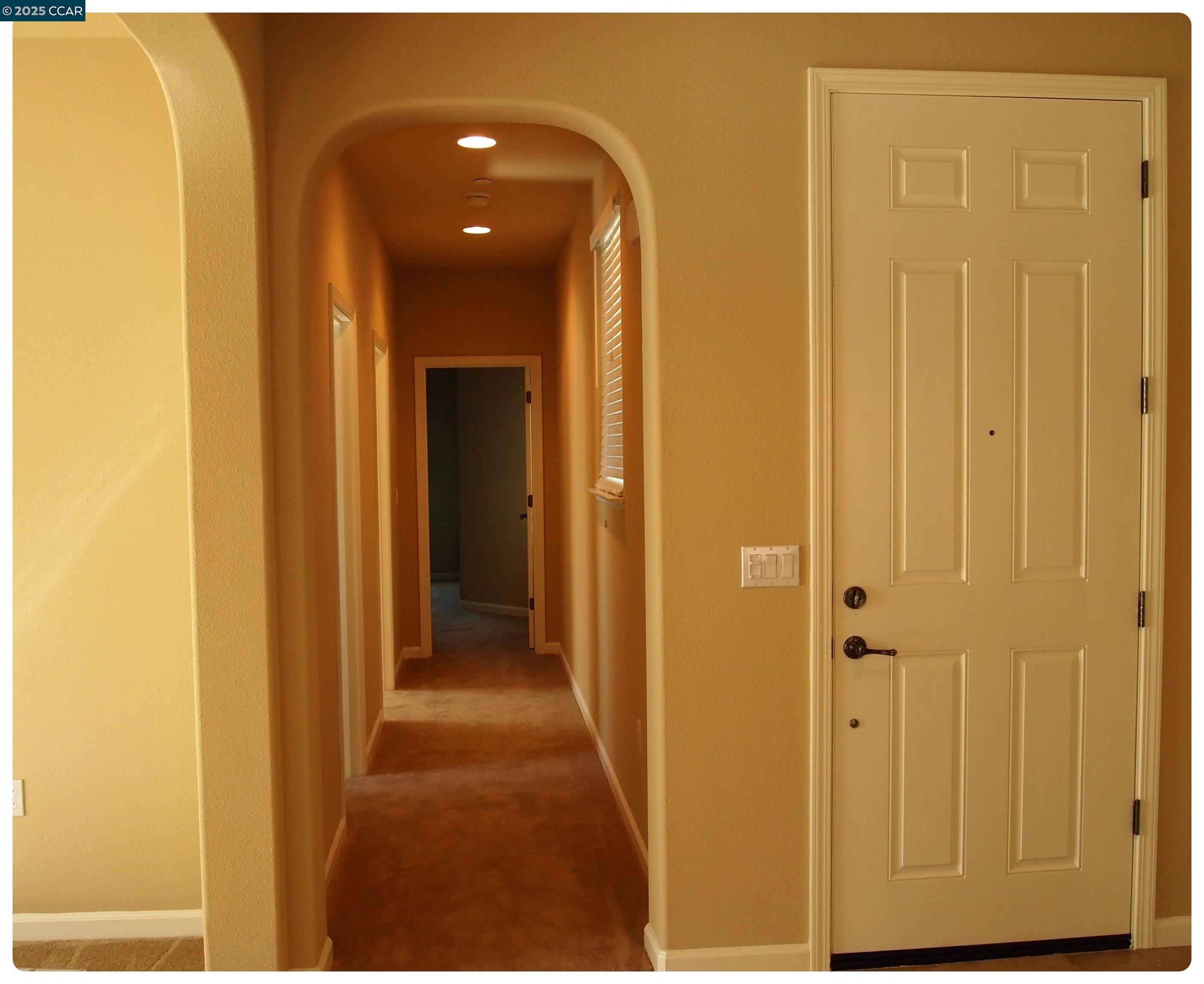 5603 Ventry Way Antioch, CA 94531 - Photo 7 of 19 a view of a hallway with wooden floor