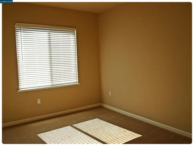a view of a room with a window