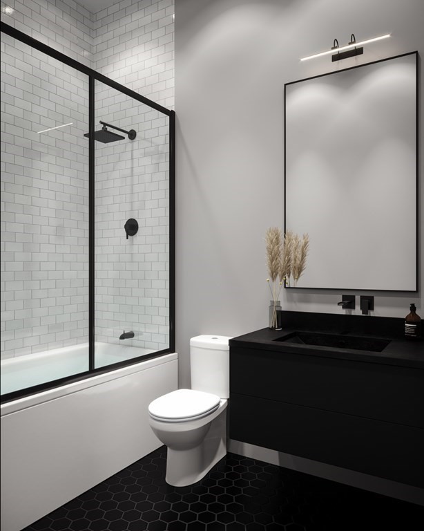 360 Meridian Street, Unit 3 Boston, MA 02128 - Photo 4 of 7 a bathroom with a toilet a sink and shower