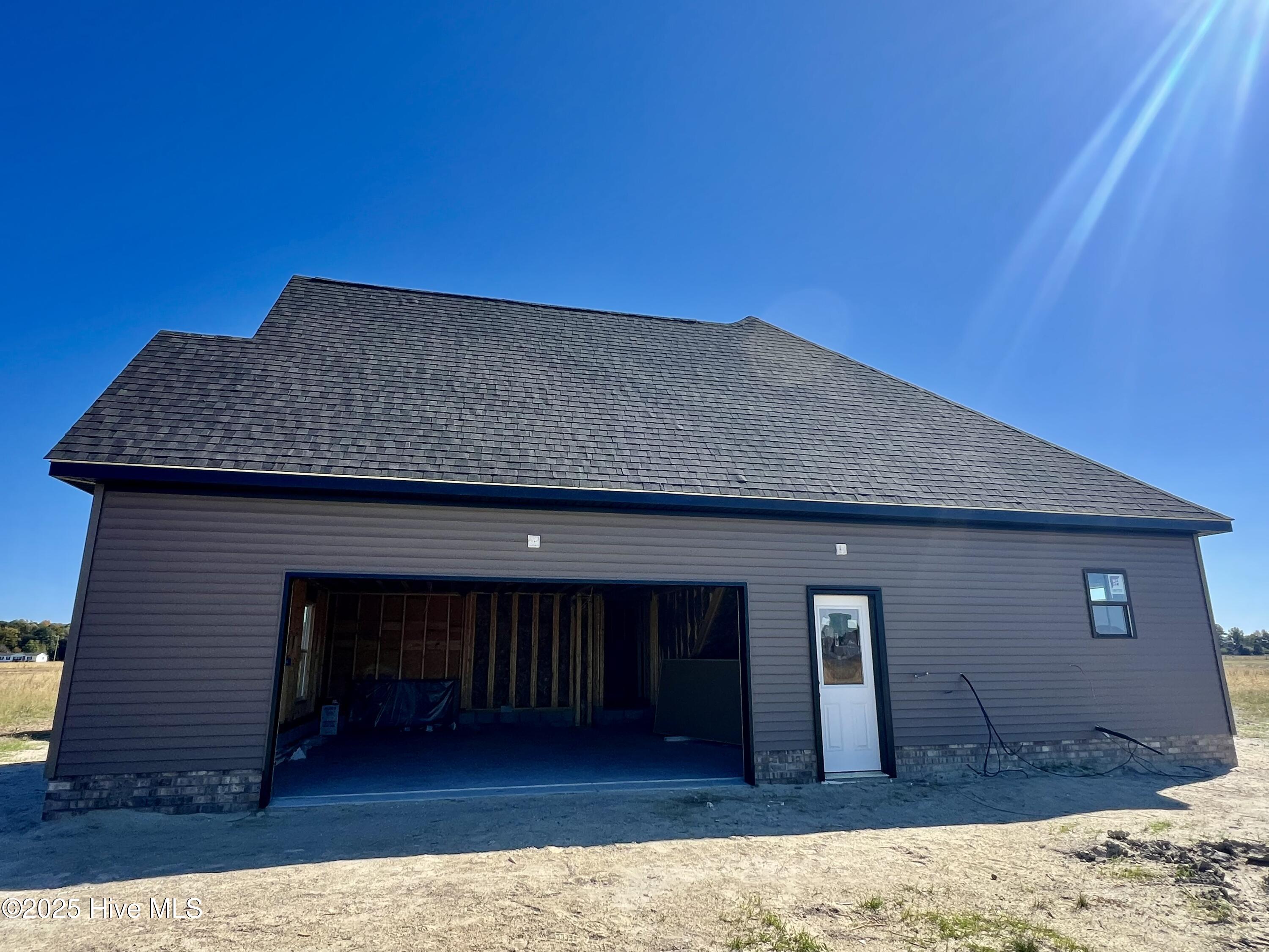 491 North Trotman Road Camden, NC 27921 - Photo 3 of 24 Side loading Garage