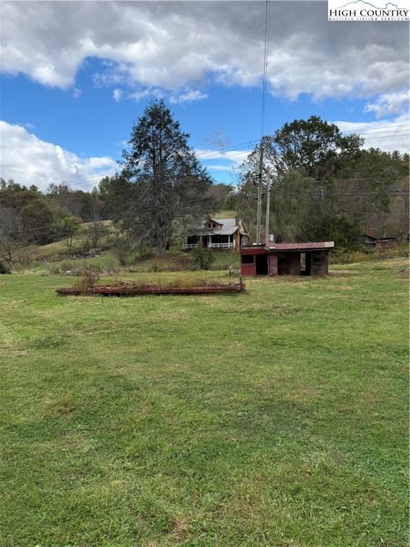 49 Loggy Hollow Road Bakersville, NC 28705 - Photo 6 of 17 a view of a yard with an outdoor space