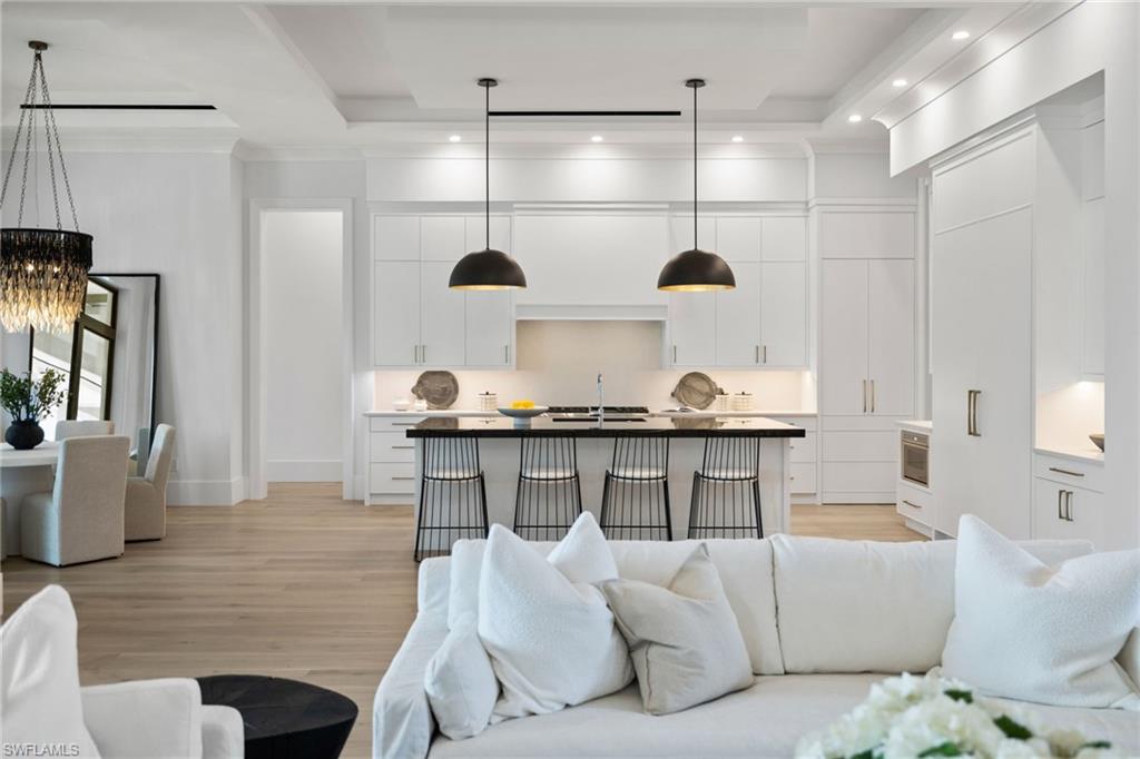 209 Tupelo Road Naples, FL 34108 - Photo 37 of 49 a living room with furniture and a window
