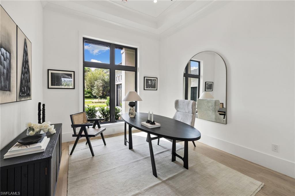 209 Tupelo Road Naples, FL 34108 - Photo 9 of 49 a view of a livingroom with furniture and a window