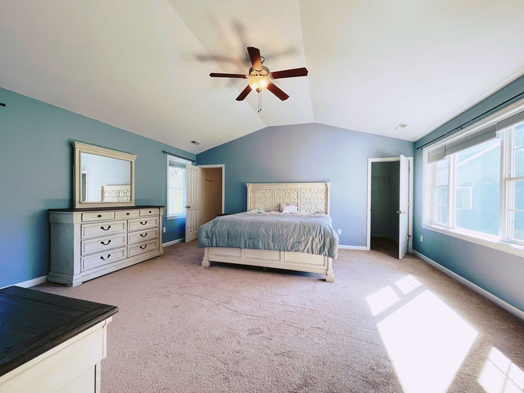 18 Windsor Road Shirley, MA 01464 - Photo 19 of 33 a bedroom with a bed and a window