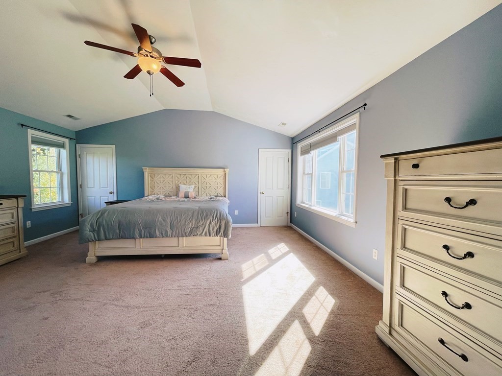 18 Windsor Road Shirley, MA 01464 - Photo 20 of 33 a bedroom with a bed and a dresser