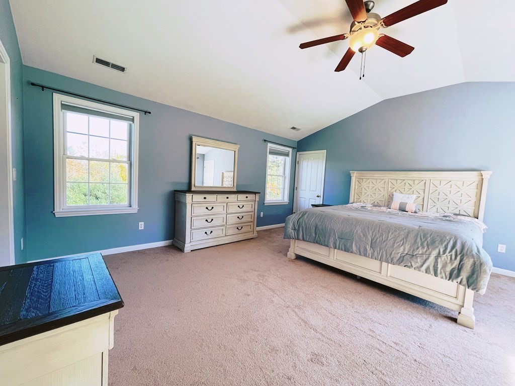 18 Windsor Road Shirley, MA 01464 - Photo 21 of 33 a bedroom with a bed and a window