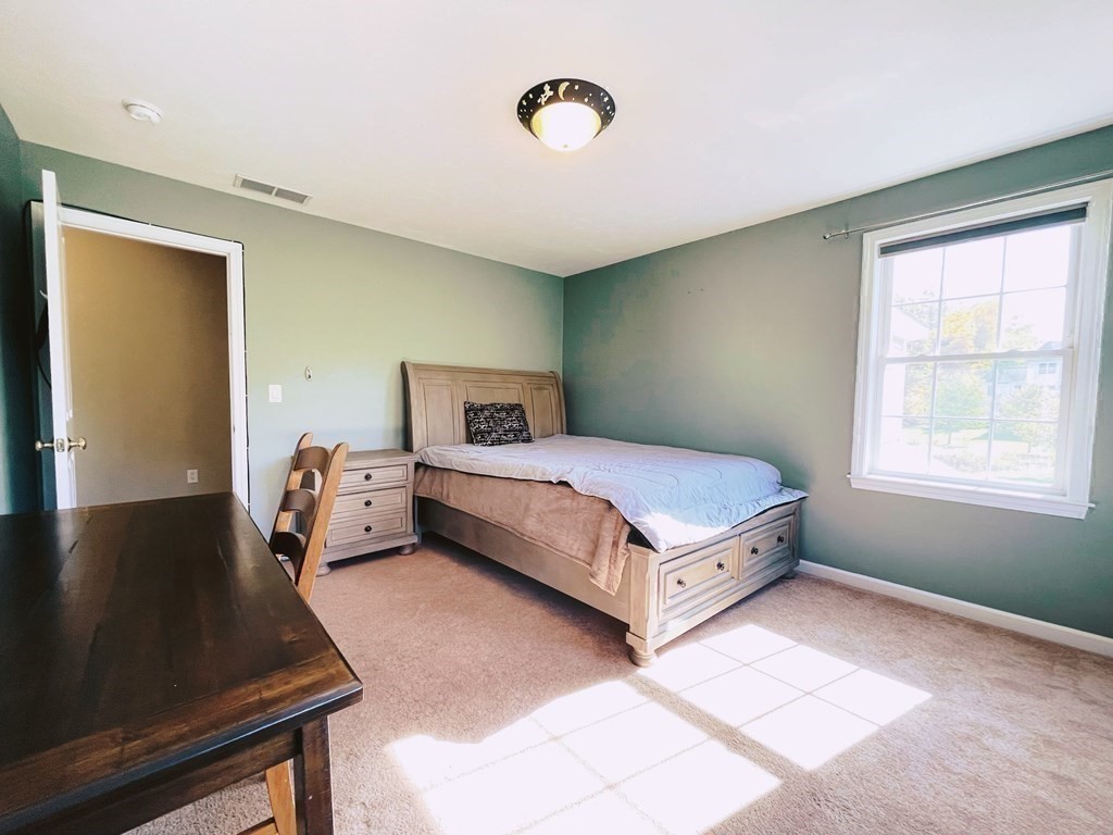 18 Windsor Road Shirley, MA 01464 - Photo 25 of 33 a room with a bed and window
