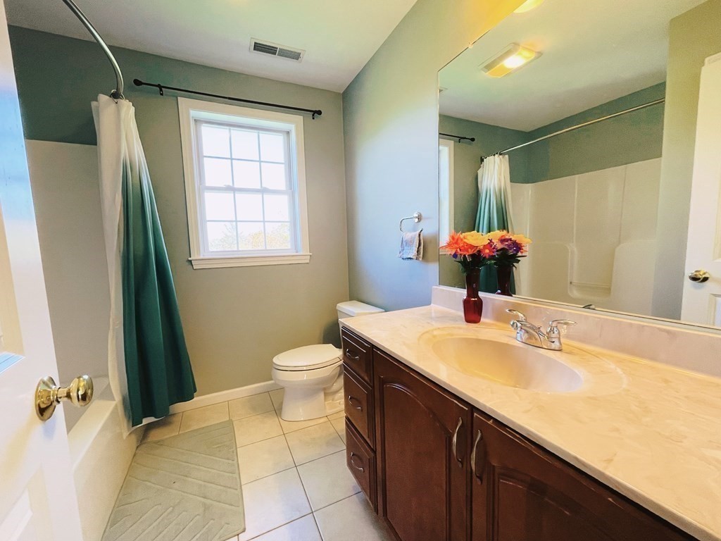 18 Windsor Road Shirley, MA 01464 - Photo 28 of 33 a bathroom with a sink toilet and tub