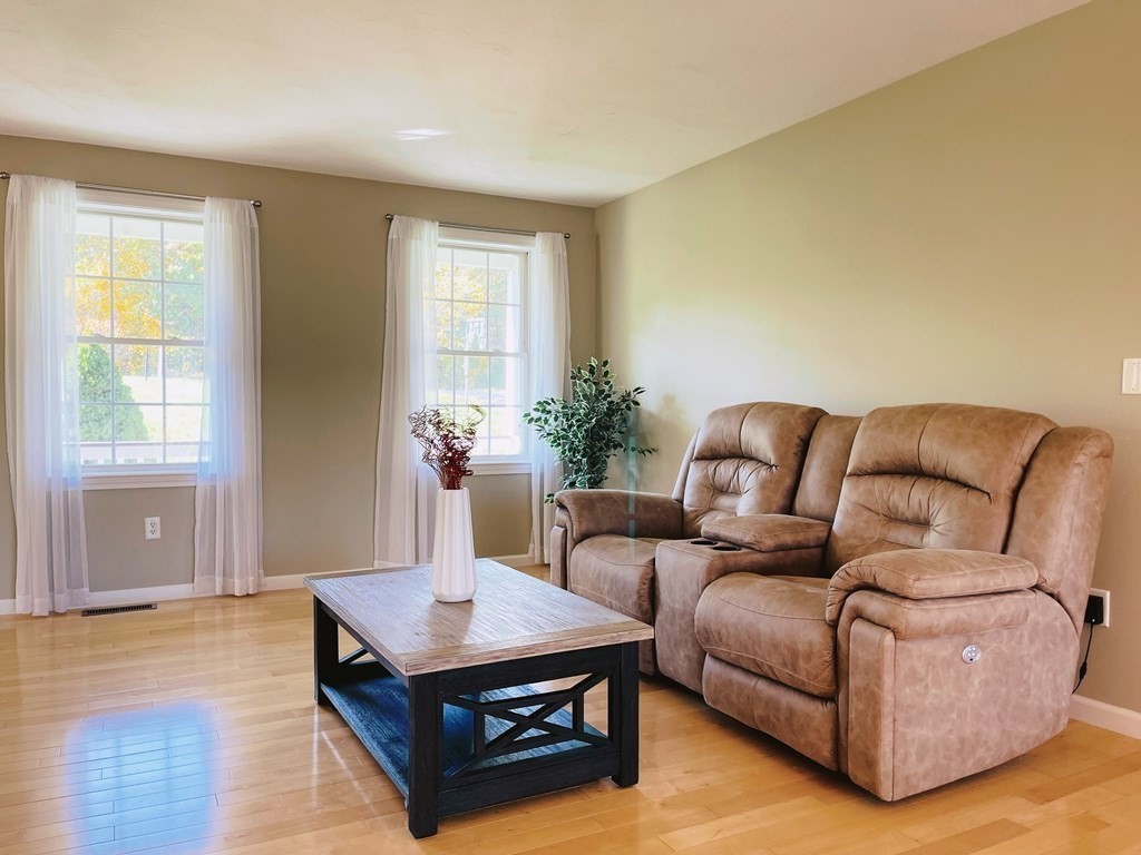 18 Windsor Road Shirley, MA 01464 - Photo 3 of 33 a living room with furniture and wooden floor