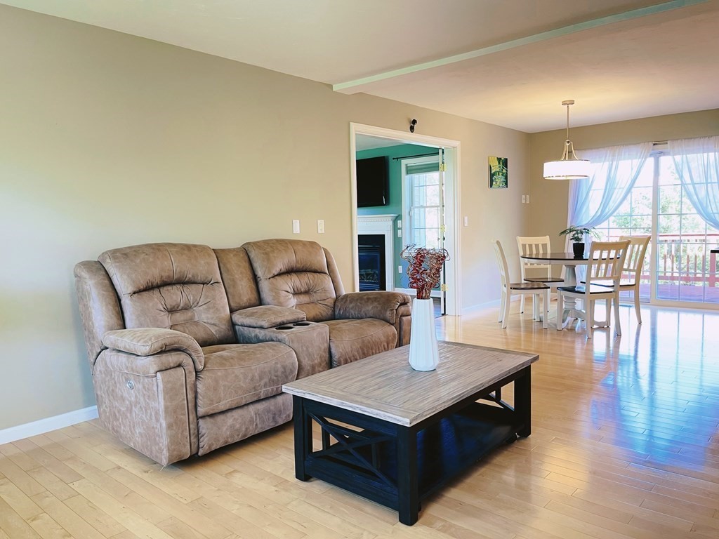 18 Windsor Road Shirley, MA 01464 - Photo 4 of 33 a living room with furniture and wooden floor