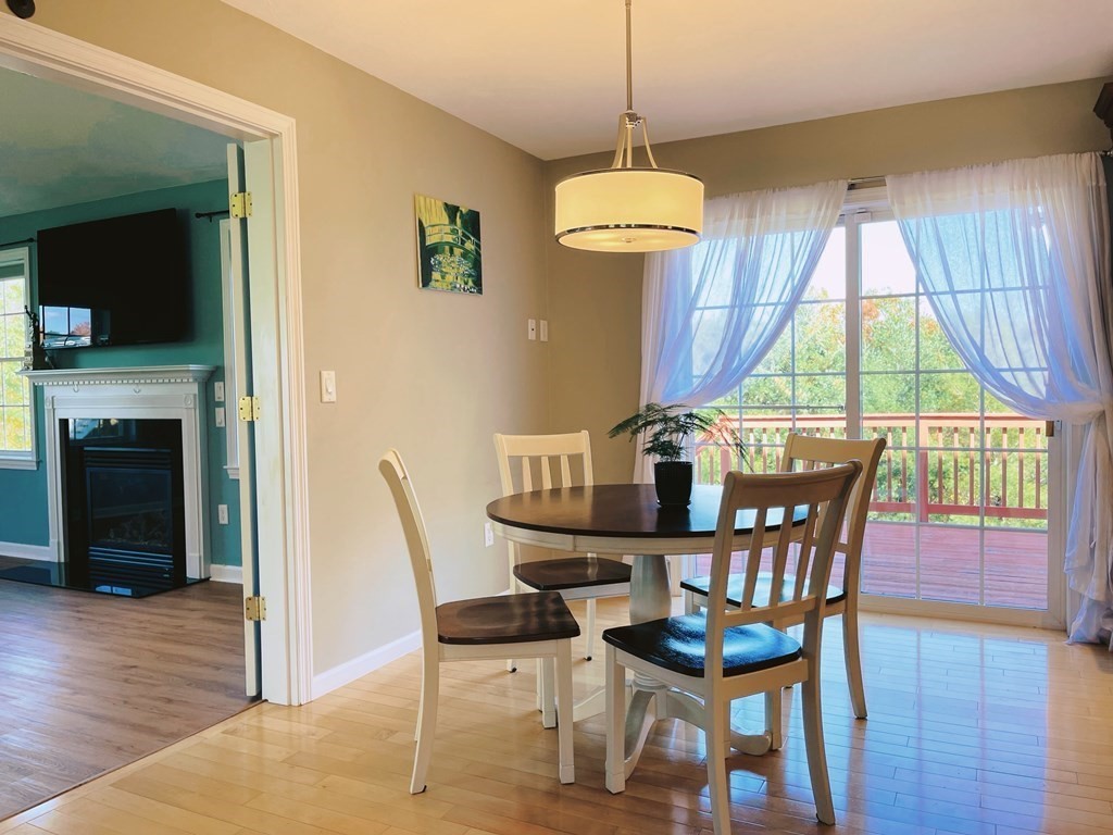 18 Windsor Road Shirley, MA 01464 - Photo 5 of 33 a view of a dining room with furniture window and wooden floor