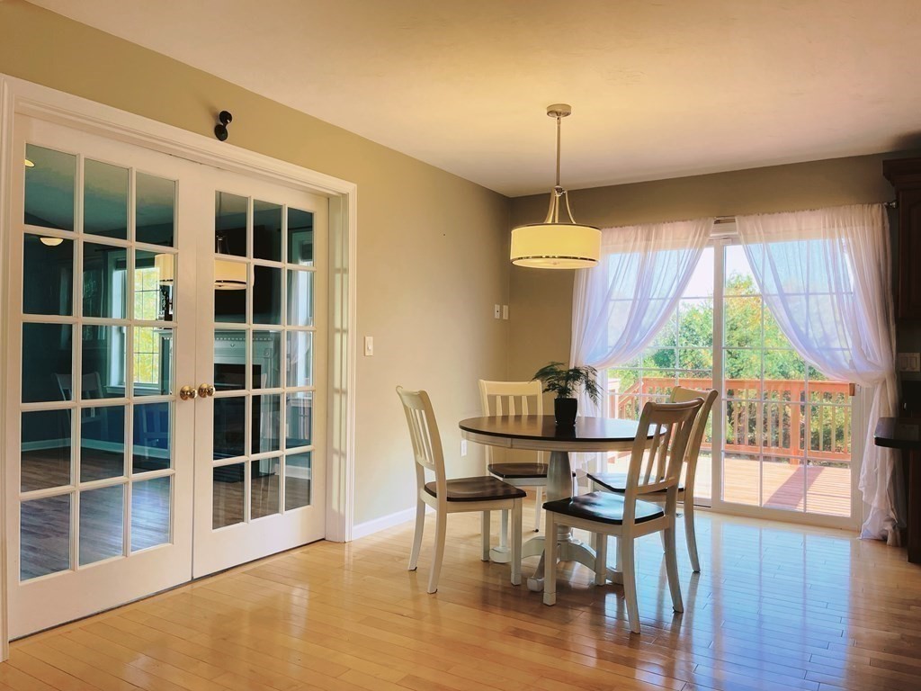 18 Windsor Road Shirley, MA 01464 - Photo 6 of 33 a dining room with furniture window wooden floor