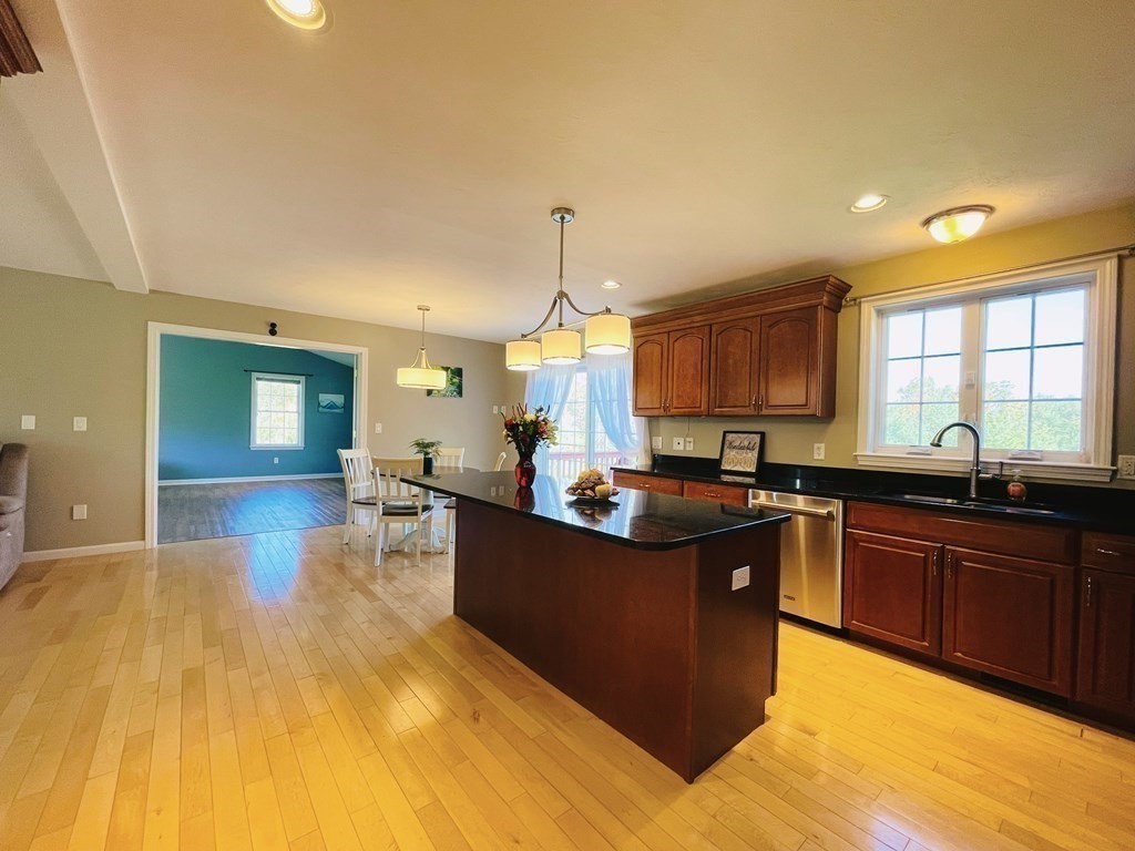 18 Windsor Road Shirley, MA 01464 - Photo 9 of 33 a large kitchen with lots of counter space and windows