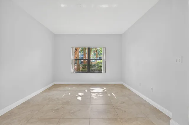 a view of a garden with a tree