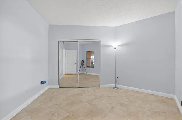 a front view of a house with a yard table and chairs