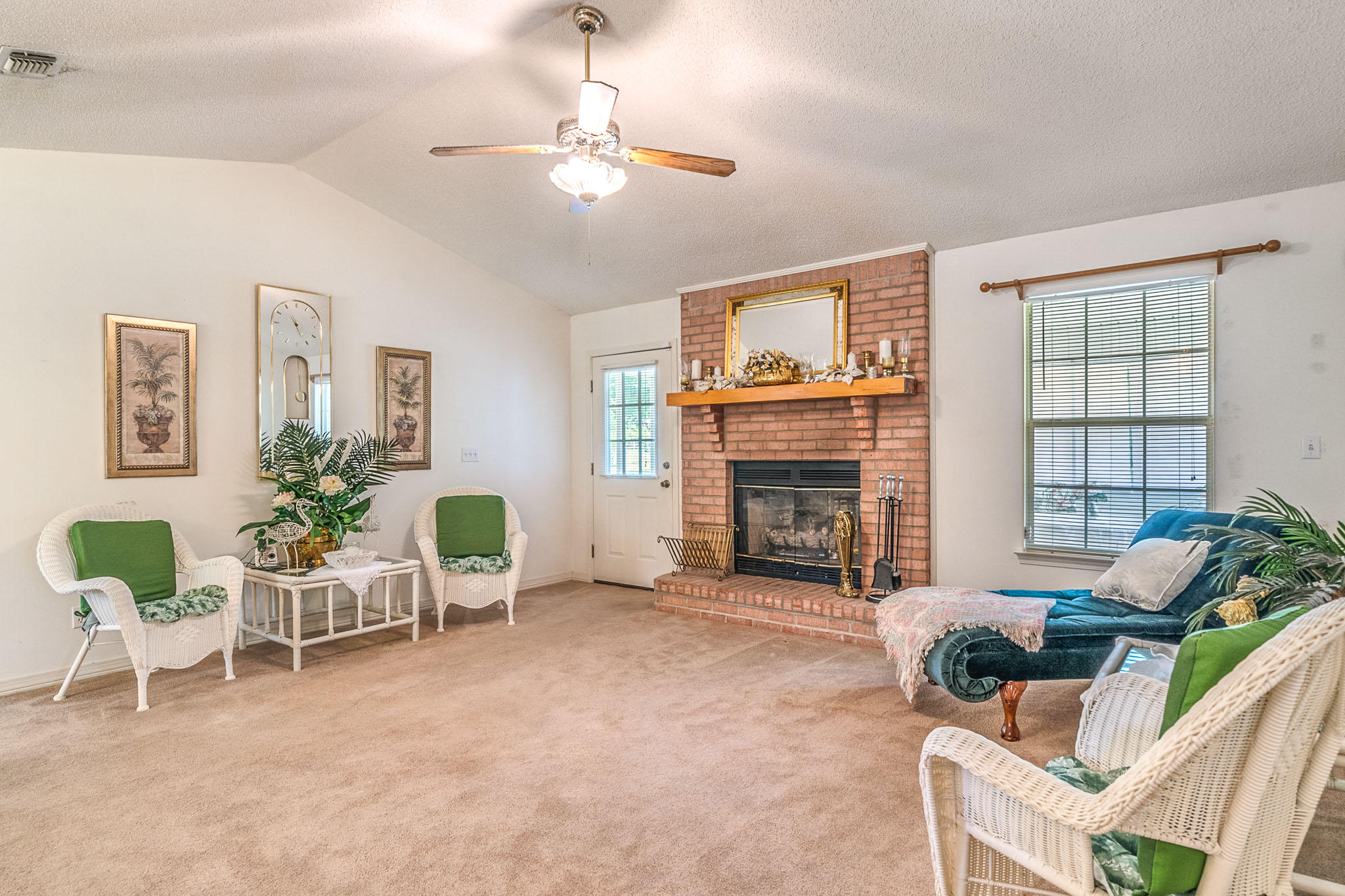 6087 Bud Moulton Road Crestview, FL 32536 - Photo 2 of 30 a living room with furniture and a fireplace