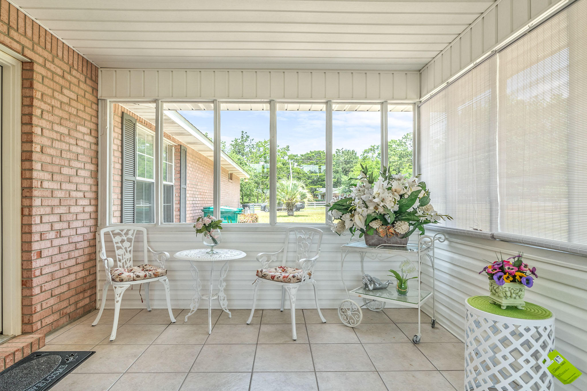 6087 Bud Moulton Road Crestview, FL 32536 - Photo 25 of 30 a dining room with furniture and large windows