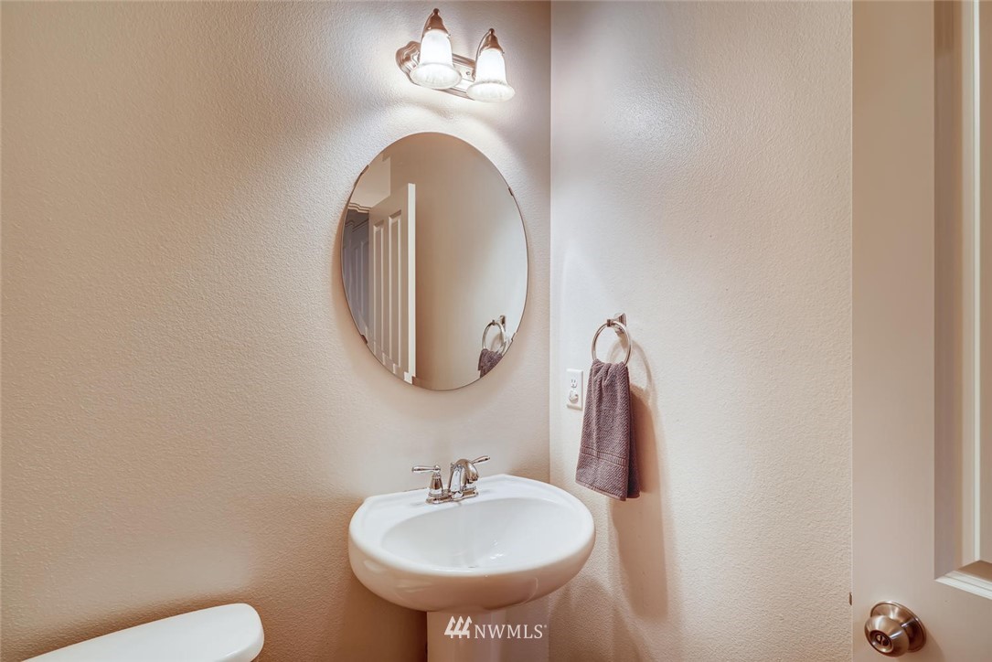 22325 36th Avenue Southeast Bothell, WA 98021 - Photo 11 of 22 a bathroom with a sink and a mirror