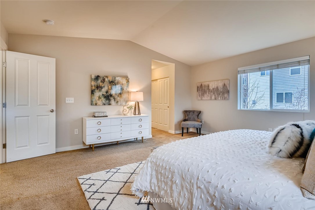 22325 36th Avenue Southeast Bothell, WA 98021 - Photo 13 of 22 a bedroom with a bed and a dresser
