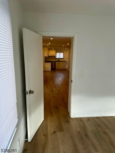 9 Fraser Street, Unit 2 Woodbridge, NJ 08863 - Photo 16 of 16 a view of a bathroom from a hallway