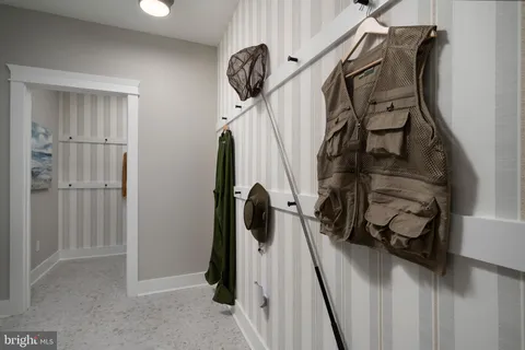 a outdoor space with patio the couches and a fireplace