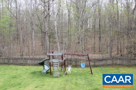 79 Riverside Drive Palmyra, VA 22963 - Photo 4 of 17 a view of outdoor space with garden and seating area
