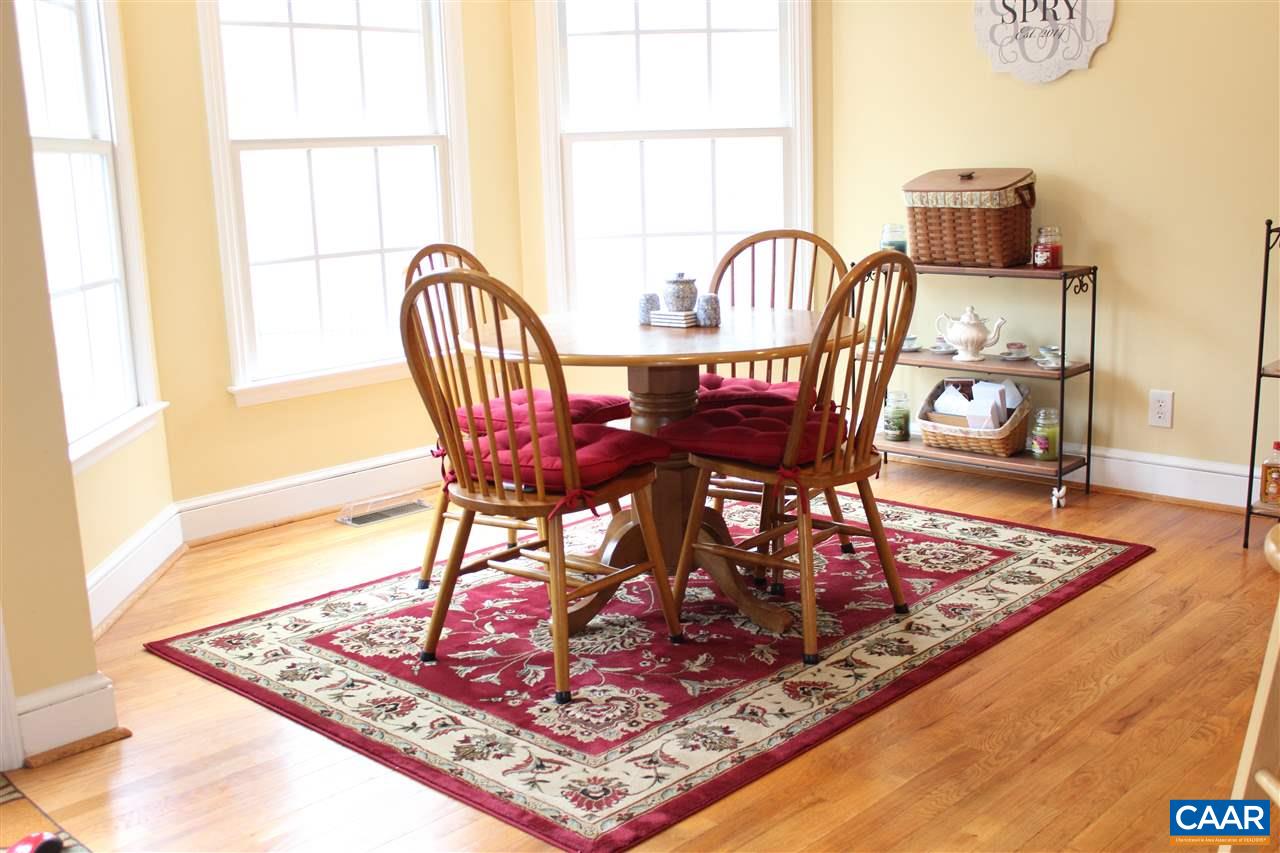 79 Riverside Drive Palmyra, VA 22963 - Photo 6 of 17 a view of a dining room with furniture window and wooden floor
