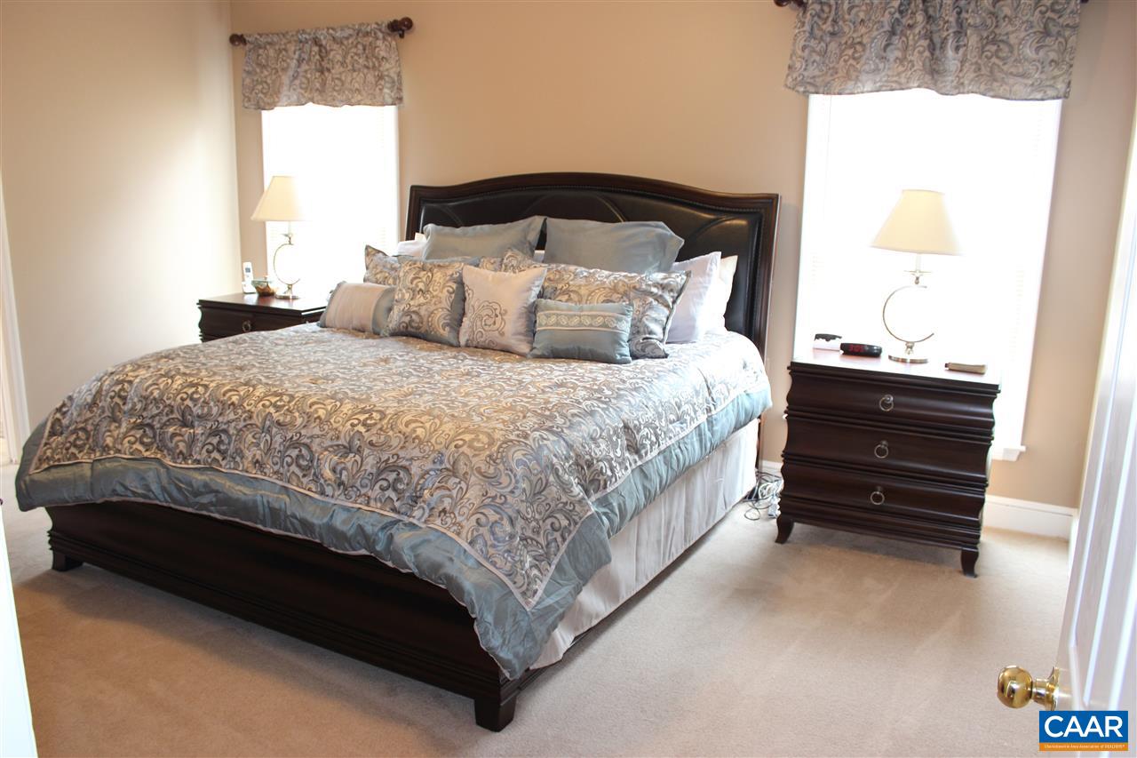 79 Riverside Drive Palmyra, VA 22963 - Photo 8 of 17 a bedroom with a bed and a window
