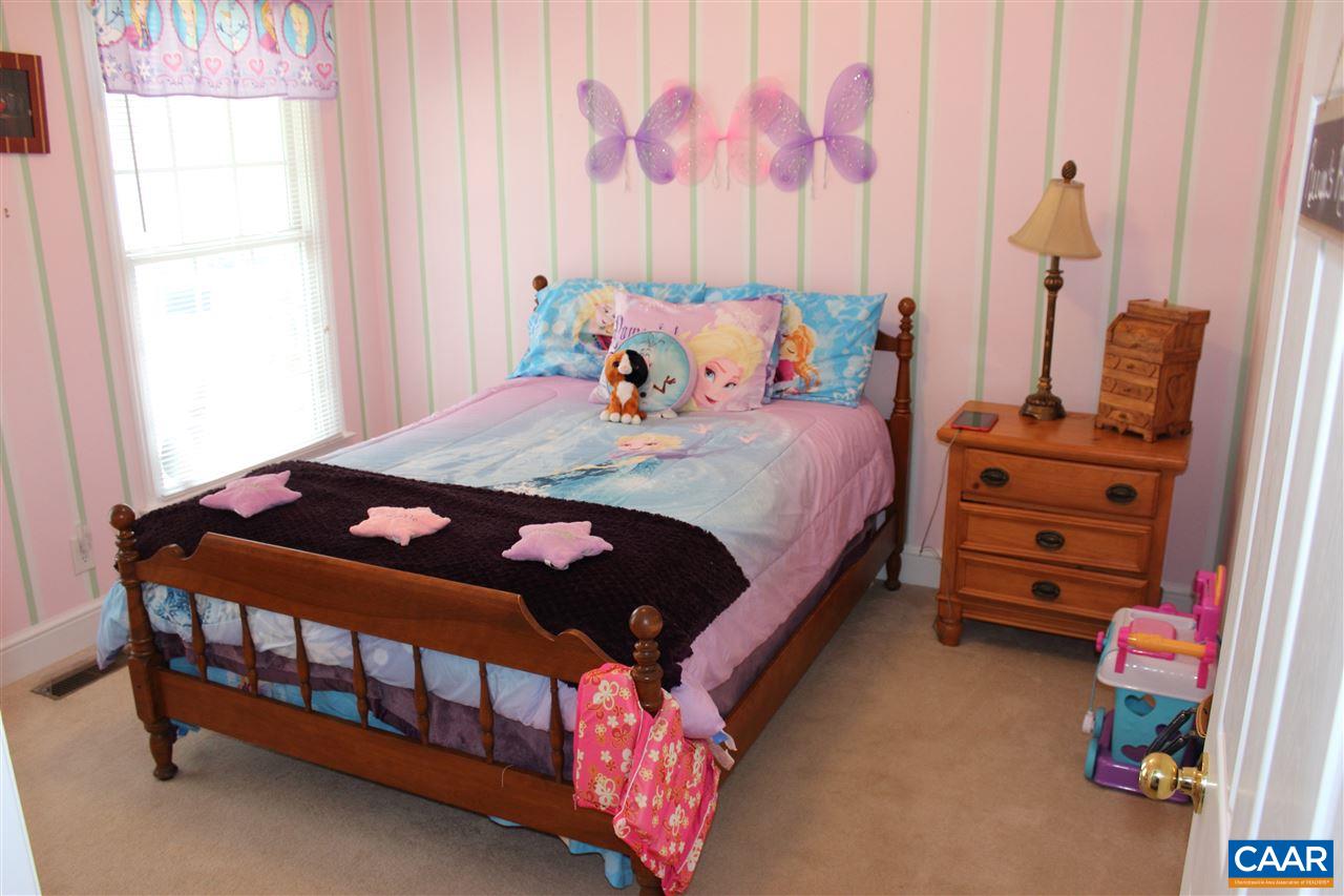 79 Riverside Drive Palmyra, VA 22963 - Photo 9 of 17 a bedroom with a bed and a window