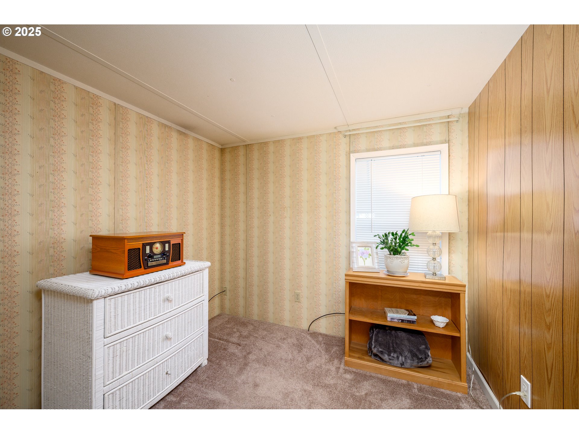 2902 East 2nd Street, Unit 108 Newberg, OR 97132 - Photo 23 of 38 a room with furniture and a window