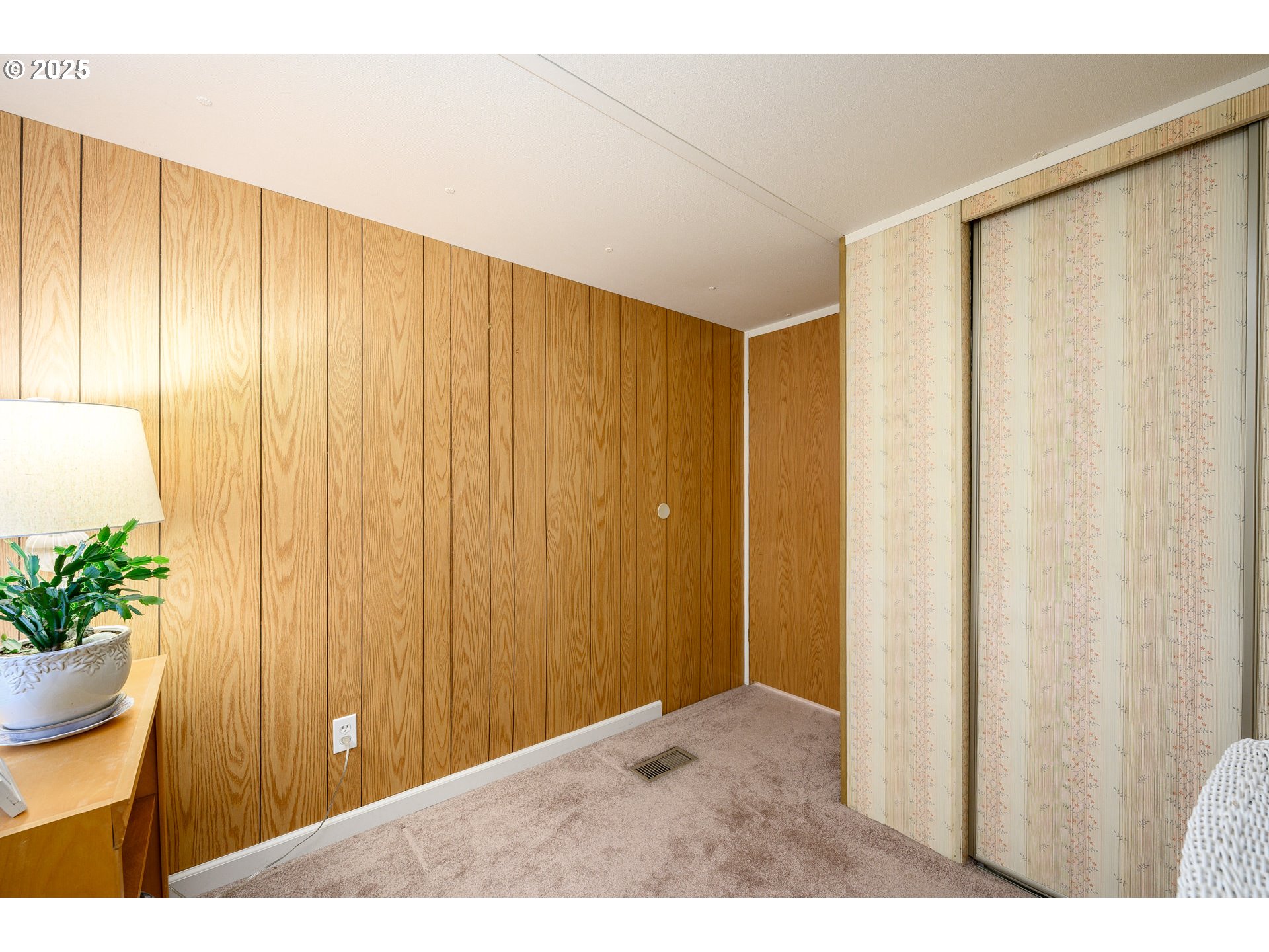 2902 East 2nd Street, Unit 108 Newberg, OR 97132 - Photo 24 of 38 a view of a room with a wooden door