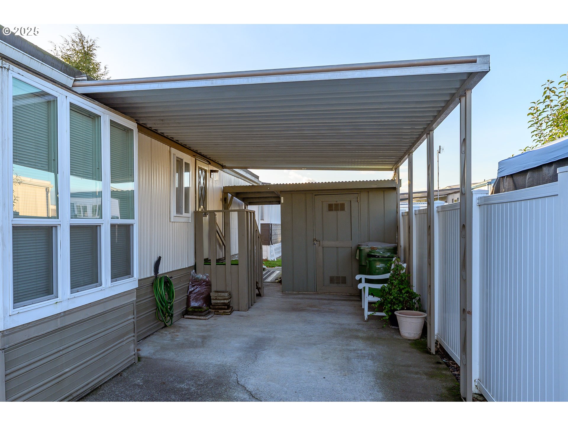 2902 East 2nd Street, Unit 108 Newberg, OR 97132 - Photo 33 of 38 a porch with seating space