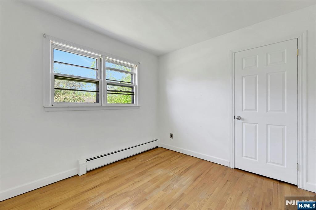 20 Blue Hill Road Norwood, NJ 07648 - Photo 27 of 49 an empty room with a window