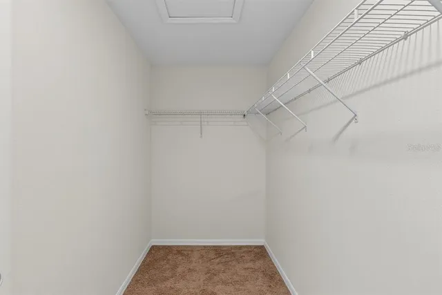 a view of a room with racks on the wall