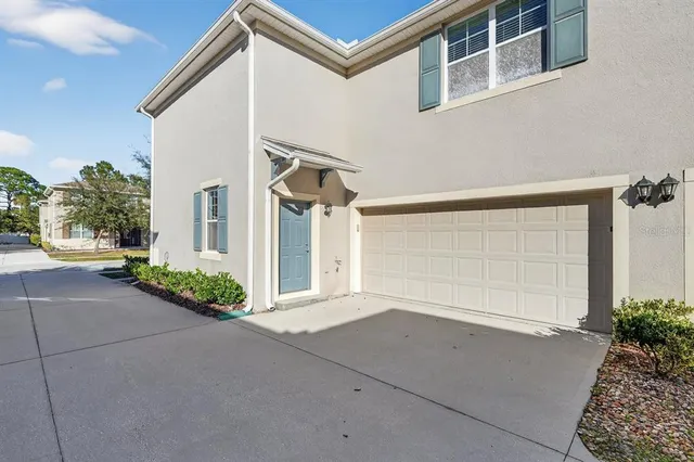 aerial view of a house with a swimming pool