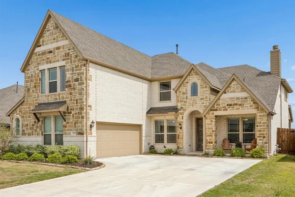 front view of a house with a yard