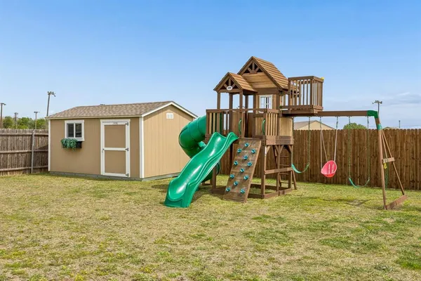 a view of a house with a park