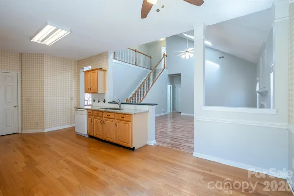 a view of a kitchen with a sink