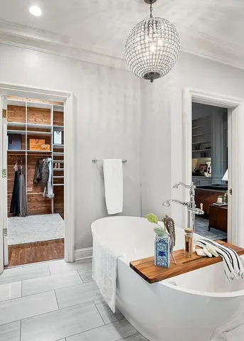 a front view of a house with lots of green space