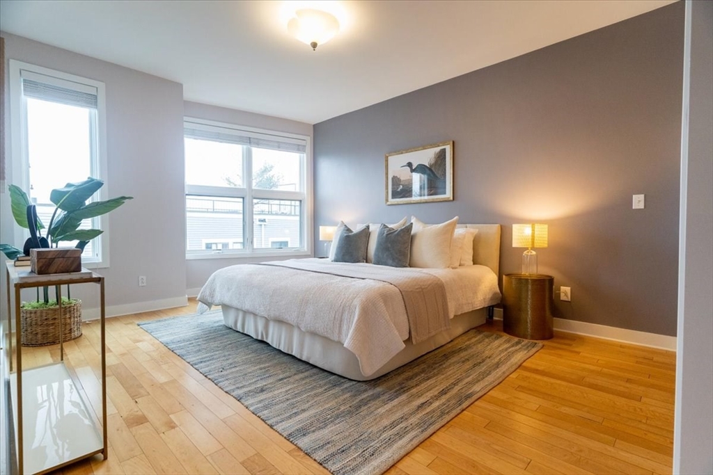 24 Bay State Road, Unit 18 Cambridge, MA 02138 - Photo 12 of 27 a bedroom with a bed and window