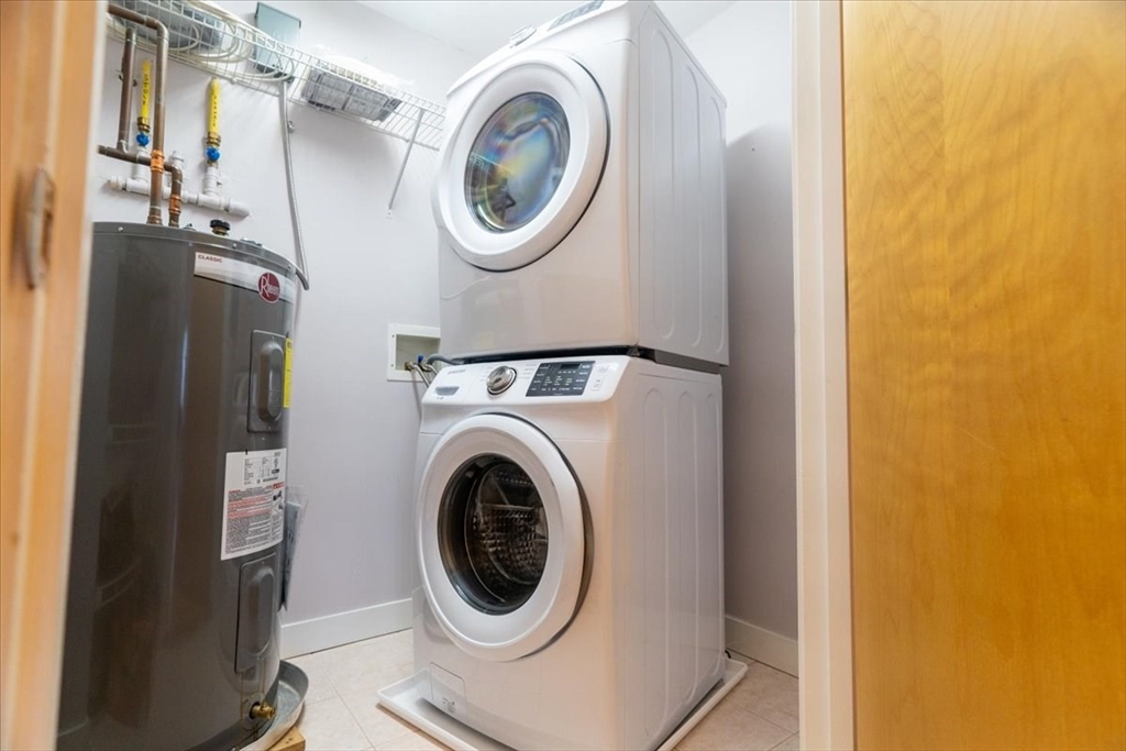 24 Bay State Road, Unit 18 Cambridge, MA 02138 - Photo 19 of 27 a utility room with dryer and washer