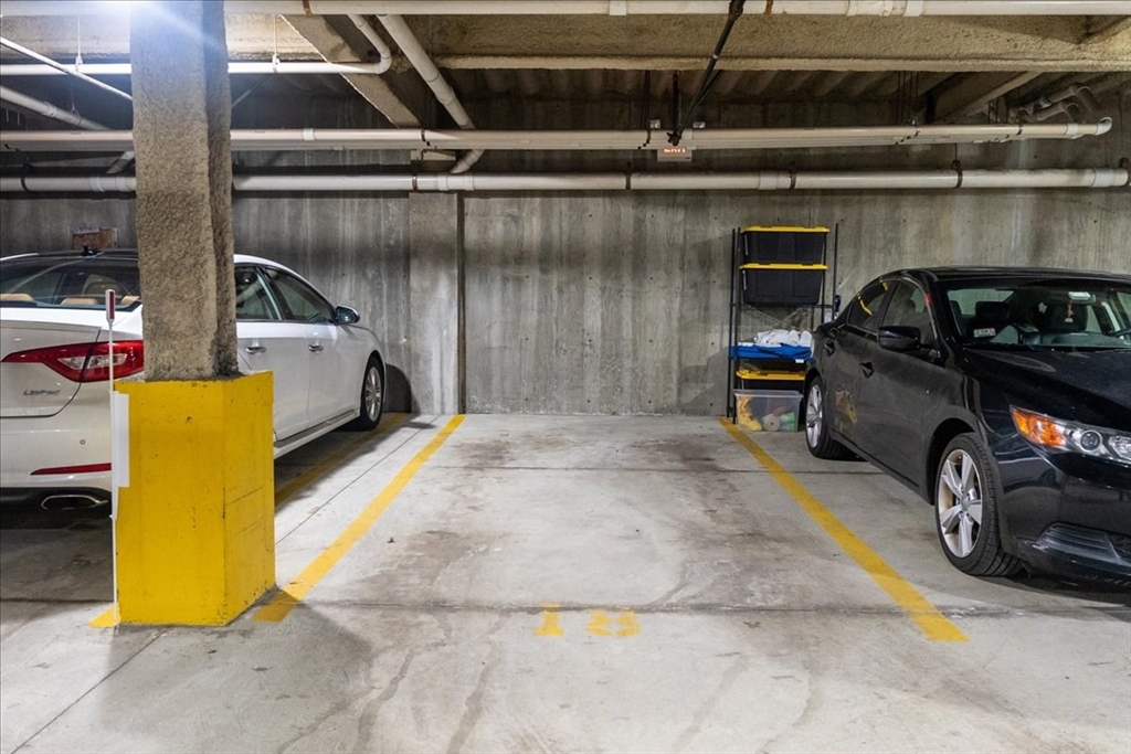 24 Bay State Road, Unit 18 Cambridge, MA 02138 - Photo 20 of 27 a car parked in a garage