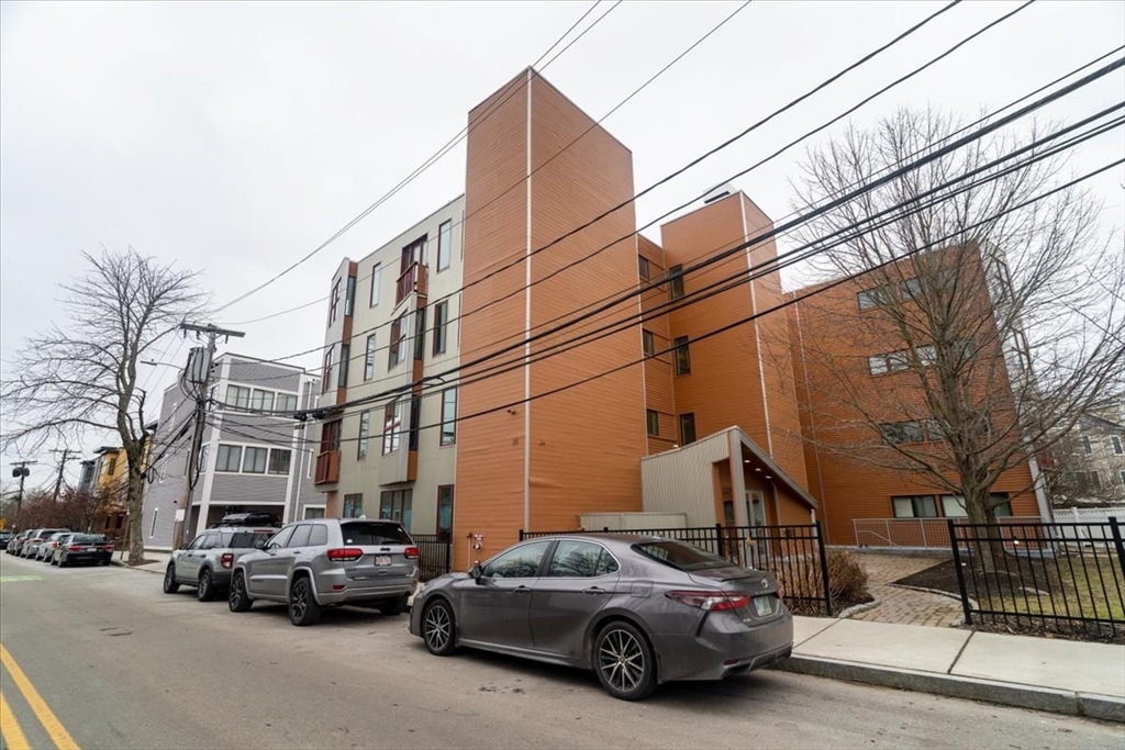 24 Bay State Road, Unit 18 Cambridge, MA 02138 - Photo 22 of 27 a view of a city street with a building