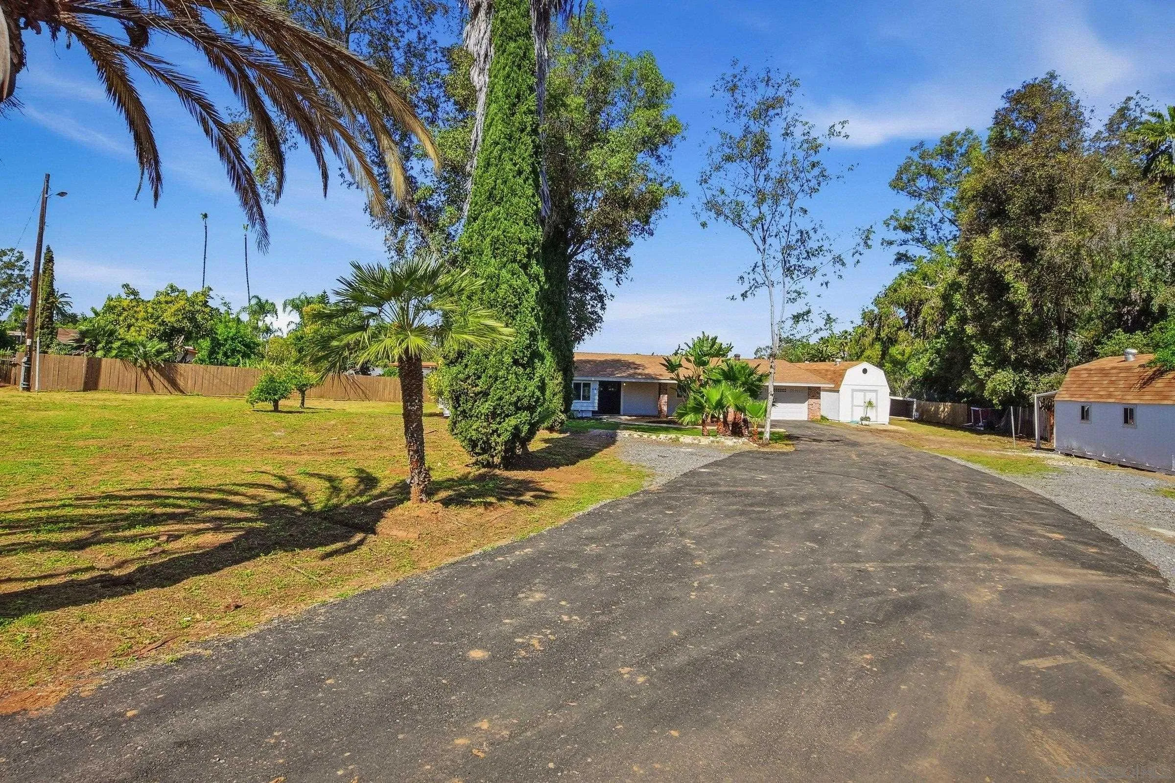 646 Barsby Street Vista, CA 92084 - Photo 11 of 48 a view of a street with a building in the background