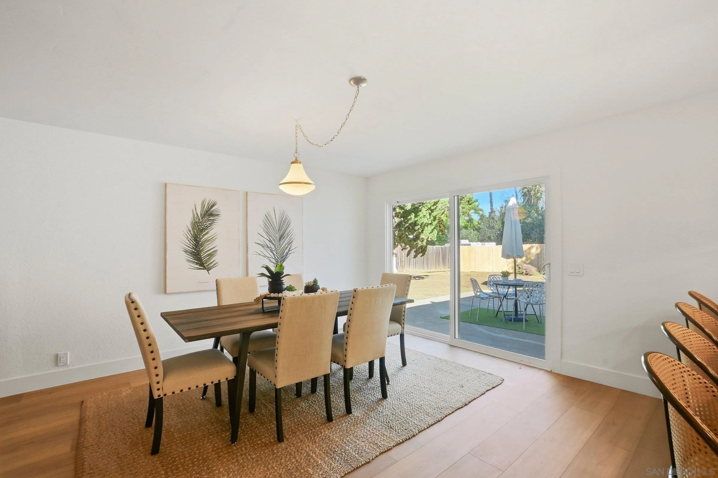646 Barsby Street Vista, CA 92084 - Photo 18 of 48 a table and chairs in a room
