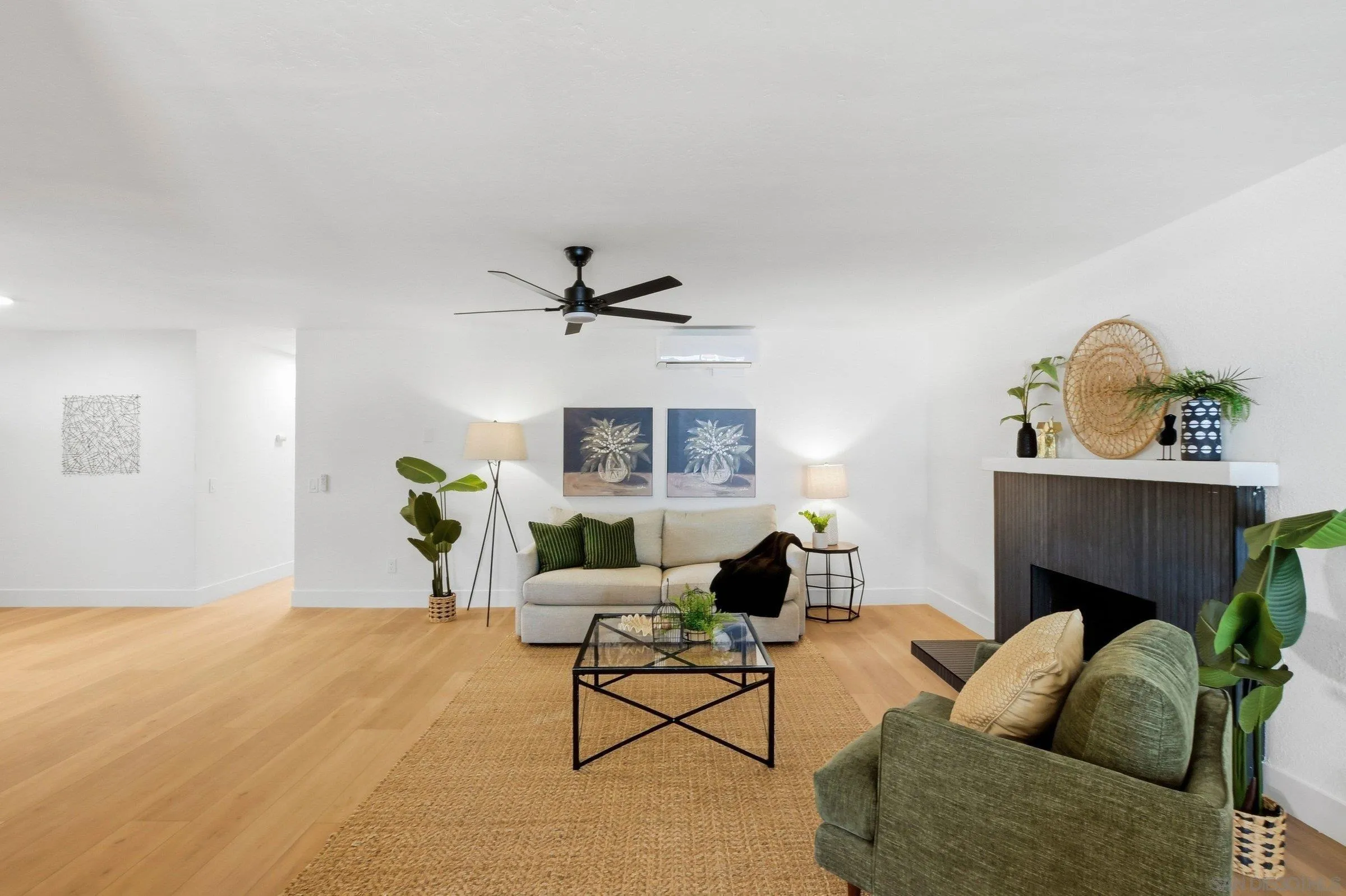 646 Barsby Street Vista, CA 92084 - Photo 21 of 48 a living room with furniture and a wooden floor